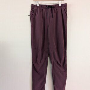 Nike Unlimited Men's Dri-FIT Tapered Leg Versatile Pants FB7546-652 Burgundy L